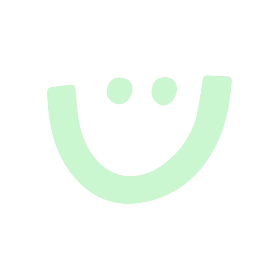 A green hand drawn smiley face.